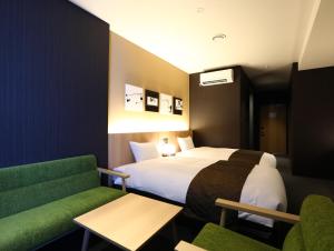 Postel nebo postele na pokoji v ubytování Hotel Wing International Kyoto - Shijo Karasuma + 37 fotografií