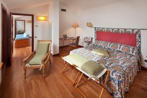 Postel nebo postele na pokoji v ubytování Hotel Villa Undulna - Terme della Versilia
