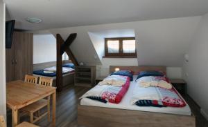 Postel nebo postele na pokoji v ubytování Apartments Stein