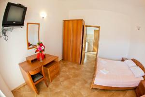 Postel nebo postele na pokoji v ubytování Apartments Stanka