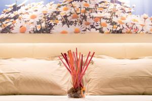 A bed or beds in a room at B&B Li Tarici