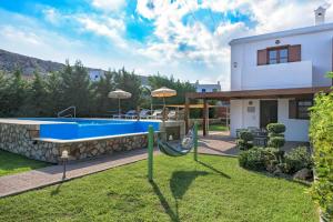 The swimming pool at or close to Lindos Emerald