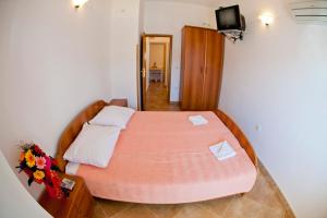 Postel nebo postele na pokoji v ubytování Apartments Stanka