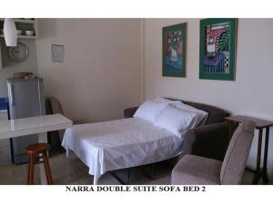 Postel nebo postele na pokoji v ubytování Agreeable Family Baguio Suites