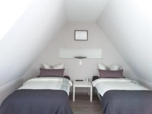 A bed or beds in a room at Kleines Zuhause
