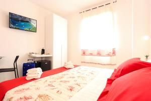 Letto o letti in una camera di Rosso di Mare Alghero