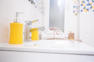 Letto o letti in una camera di Rosso di Mare Alghero