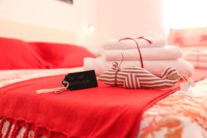 Letto o letti in una camera di Rosso di Mare Alghero