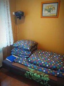 Postel nebo postele na pokoji v ubytování SłonecznyDom (SunnyHome) w Łunowie