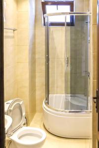 Koupelna v ubytování Samni Hotel