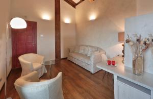 A bed or beds in a room at RELAIS VAL D'ORCIA