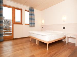 Posteľ alebo postele v izbe v ubytovaní Bio Hotel Benny