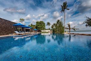 Bazén v ubytování The Residence Bintan nebo v jeho okolí