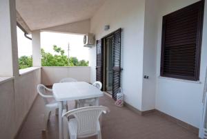 A balcony or terrace at B&B Tra gli ulivi