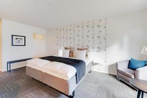 Voodi või voodid majutusasutuse Hotel Jernbanegade toas