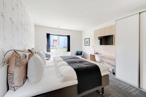Voodi või voodid majutusasutuse Hotel Jernbanegade toas
