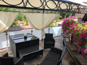 Balkón nebo terasa v ubytování Komfortable Apartments in der Villa Eule