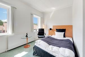 Voodi või voodid majutusasutuse Hotel Jernbanegade toas