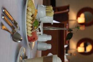 a close up of a food dispenser on a wall at Constellation Apartments in Kampala +3 photos