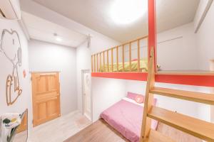 Postel nebo postele na pokoji v ubytování Happiness Pediatrics