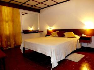 Letto o letti in una camera di Aparthotel Avenida