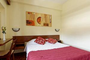 Letto o letti in una camera di Aparthotel Avenida