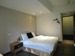 Postel nebo postele na pokoji v ubytování 237 Hotel
