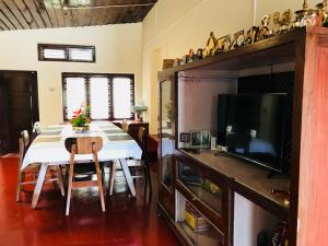 Kuchyň nebo kuchyňský kout v ubytování Shreegandha Homestay