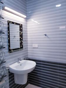 Koupelna v ubytování SNP Star Guest House + 37 fotografií
