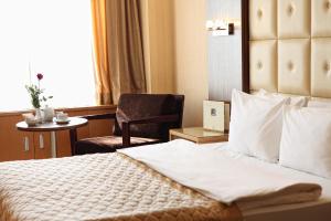 Postel nebo postele na pokoji v ubytování Surmeli Adana Hotel