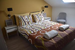 Łóżko lub łóżka w pokoju w obiekcie City Break