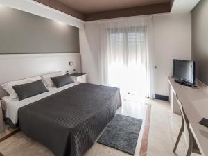 Postel nebo postele na pokoji v ubytování Hotel Giulia Ocean Club