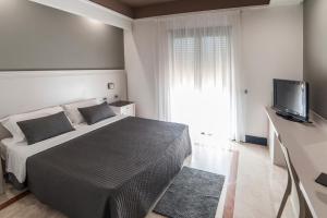 Postel nebo postele na pokoji v ubytování Hotel Giulia Ocean Club