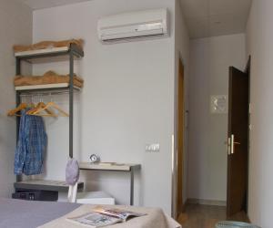 Posteľ alebo postele v izbe v ubytovaní Hostal Benidorm