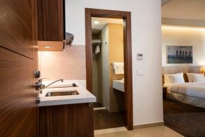 Ένα ή περισσότερα κρεβάτια σε δωμάτιο στο Citea Apart Hotel