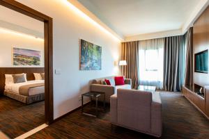 Ένα ή περισσότερα κρεβάτια σε δωμάτιο στο Citea Apart Hotel