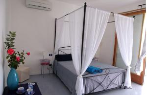 Cama o camas de una habitación en B&B Yatabui