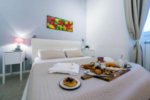Łóżko lub łóżka w pokoju w obiekcie Bella Roma Luxury Accommodation, Vatican City - Liberty Collection