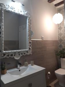Koupelna v ubytování Apartamento Corazón de Portales + 17 fotografií