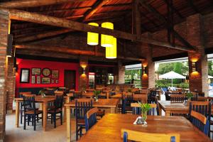 Restaurant o un lloc per menjar a Leão de Judá Charme Hotel