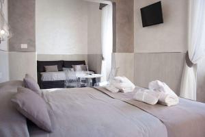 Postel nebo postele na pokoji v ubytování Hotel Agorà