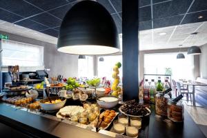 Ресторан / й інші заклади харчування у Campanile Genève - Ferney-Voltaire