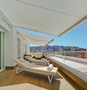 
a hotel room with a balcony overlooking the ocean at Hotel Don Pancho - Designed for Adults in Benidorm

