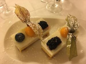 a plate of food with desserts on a table at Relais Villa Rossi in Silvi Marina