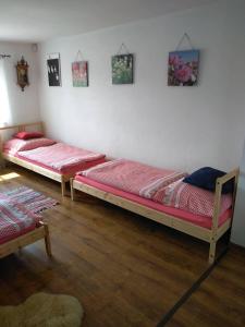 Postel nebo postele na pokoji v ubytování Vinný sklep u Mňa