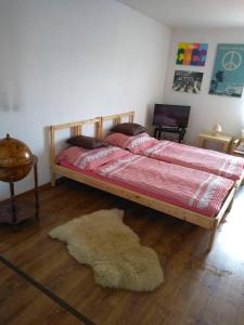 Postel nebo postele na pokoji v ubytování Vinný sklep u Mňa