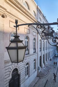 a street light in front of a building at Europe Lisboa Boutique Hotel in Lisbon
