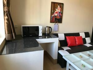 TV a/nebo společenská místnost v ubytování Tk Home 1