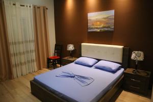 Postel nebo postele na pokoji v ubytování Hotel Nuanti