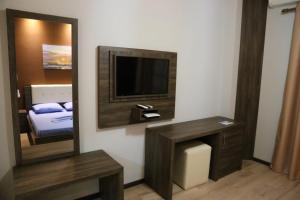 TV a/nebo společenská místnost v ubytování Hotel Nuanti